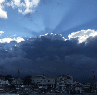 Sun Setting Behind Clouds