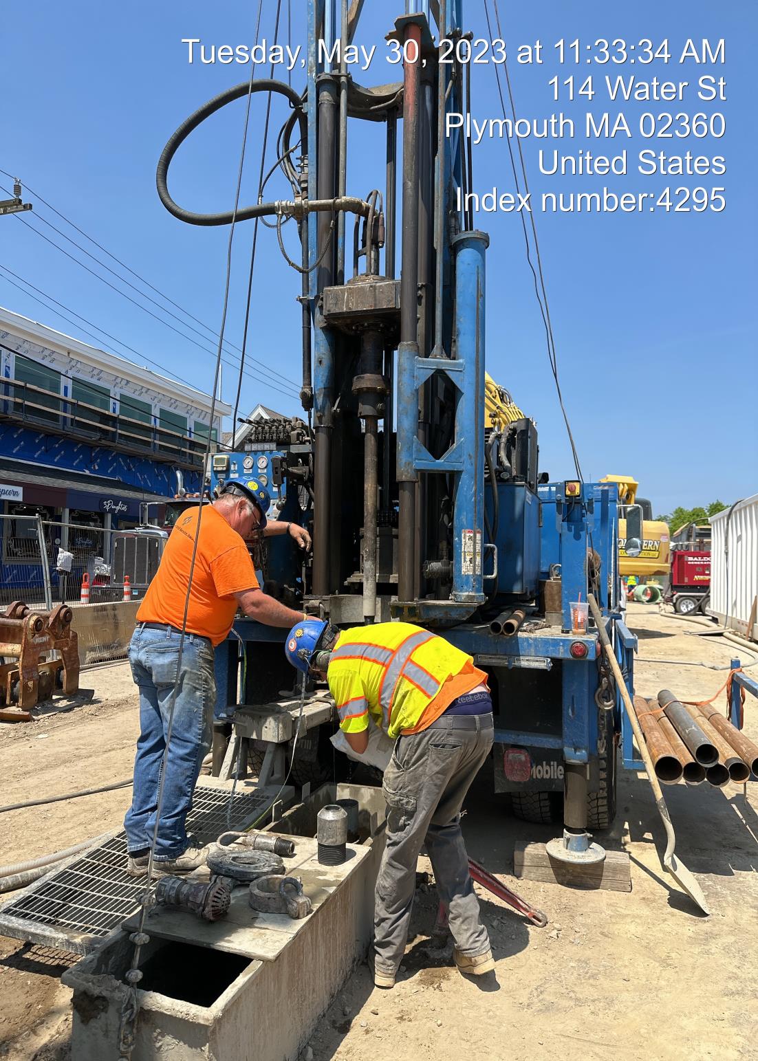 crew drilling relief well on Water Street