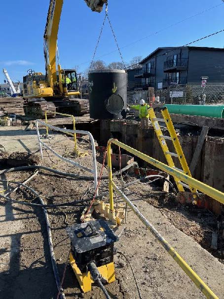 installation of fourth manhole on Water Street near Howland Street