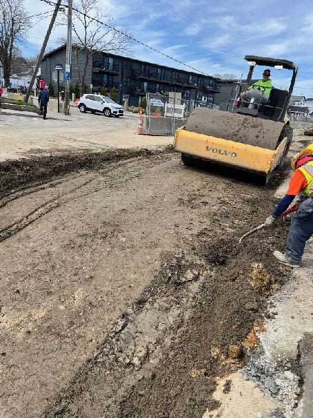 trench backfilling and material compaction along the sewer interceptor on Water Street